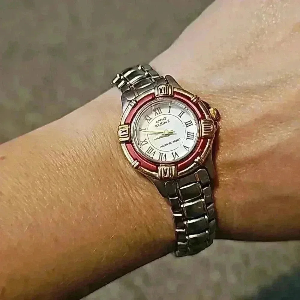 Anne Klein II Gold & Silver Tone Link Bracelet with Rotating Red Bezel Watch